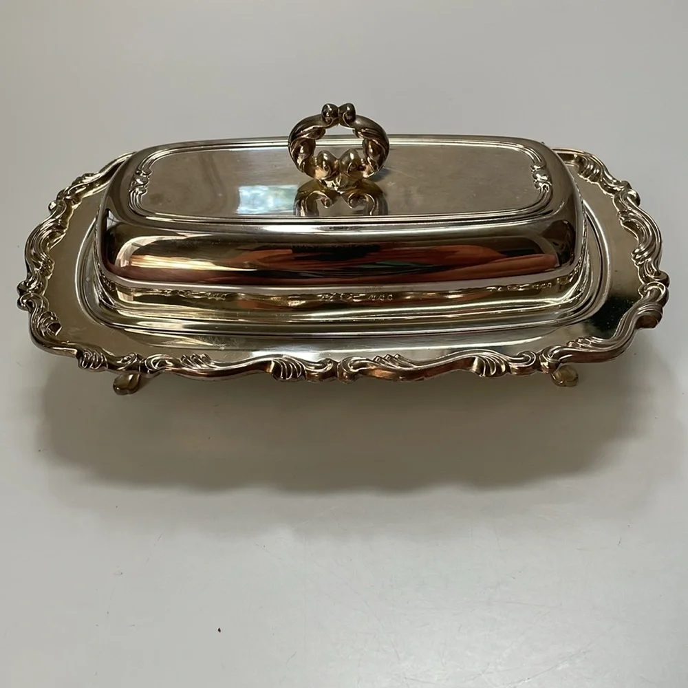 William A Rogers set of silver-plated gravy boat, butter‎ dish, & platter.